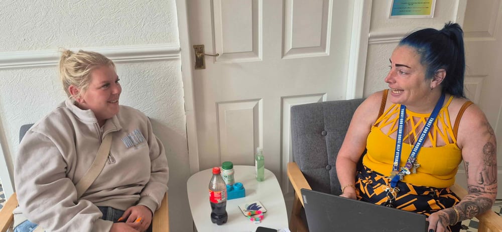 Practitioner speaking with a parent